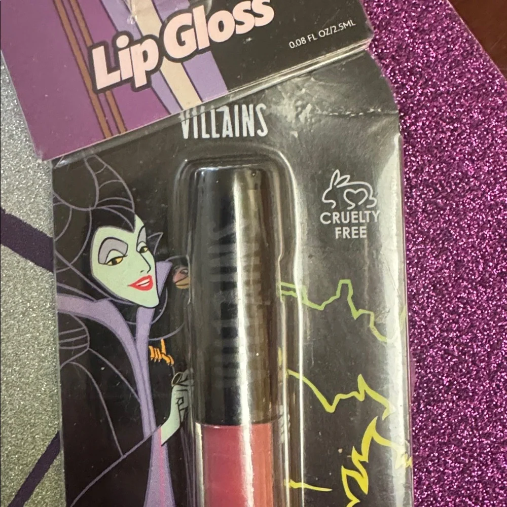 NWT 2 color DISNEY Female VILLAINS cruelty free lip gloss. Yes I see the irony.